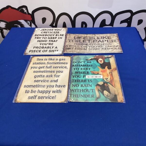 Vintage novelty tin sign with humorous phrase.