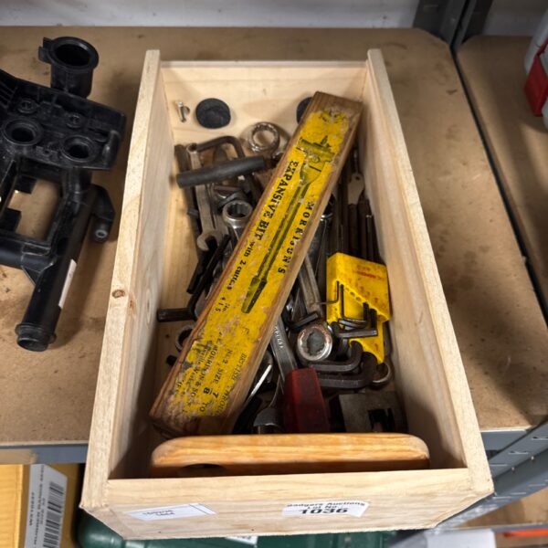 Vintage tool set with spanners and Allen keys in a wooden tray.