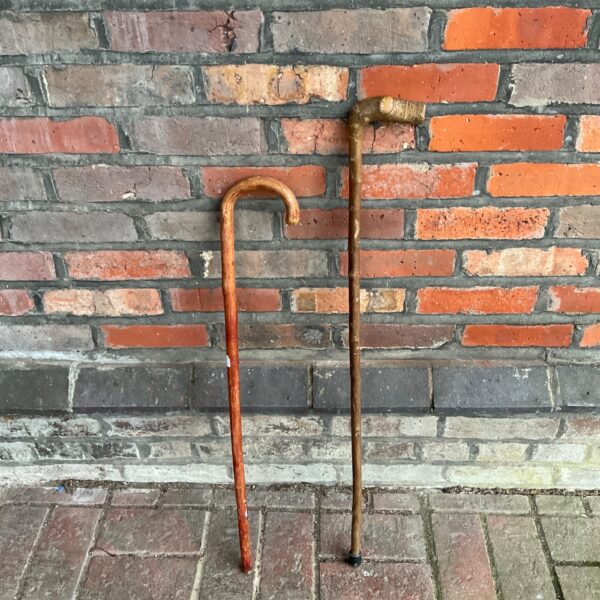 Vintage walking sticks lot, antique wooden canes for collectors.