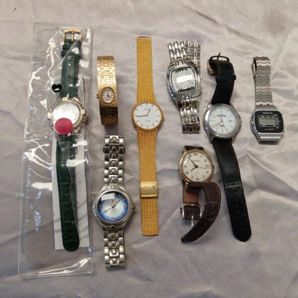Group of vintage and modern wristwatches for collectors.