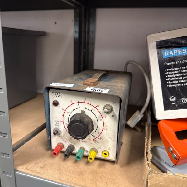 Vintage Weir power supply unit with voltage selector dial.