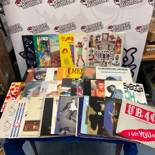 Vintage vinyl record collection featuring David Bowie and UB40.