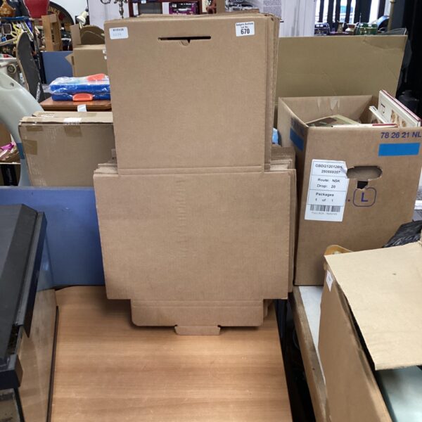 Lot of flat pack vinyl record storage boxes for LP collection.