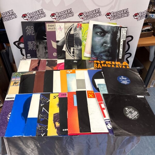 Mixed lot of 12 inch vinyl records including Plump DJs and Ice Cube.