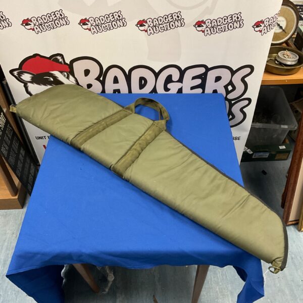 Green waterproof rifle slip case with YKK zipper.