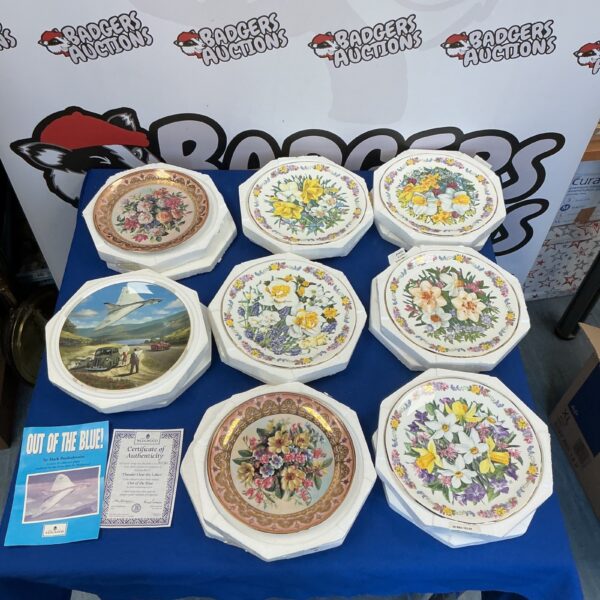 Lot of vintage Wedgwood collectible plates, including a Vulcan Bomber plate.