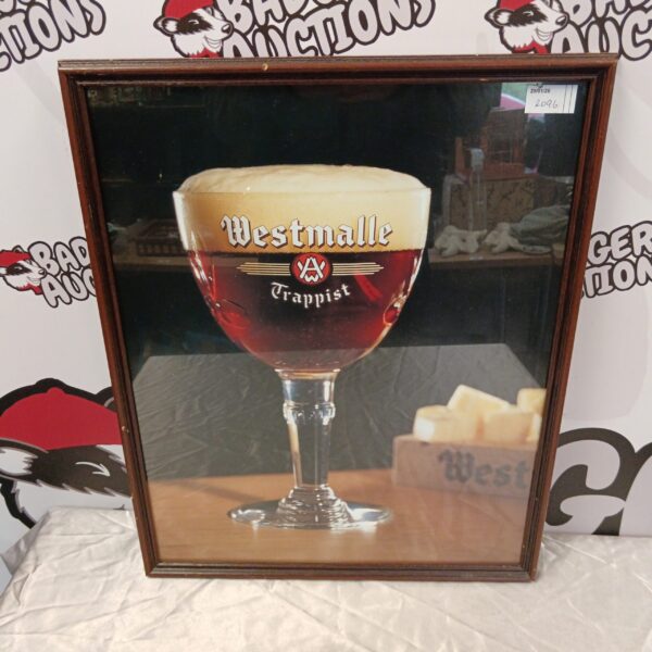 Framed Westmalle Trappist beer poster with detailed beer illustration.