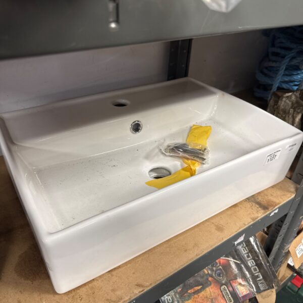 White ceramic cloakroom basin for small bathrooms.