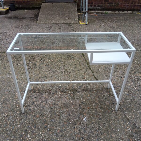 White metal desk with glass top for modern office spaces.