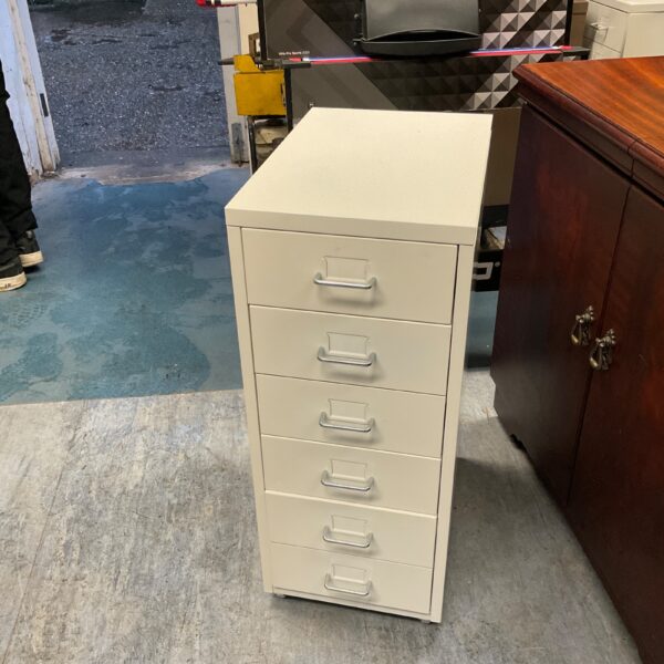 White metal workshop unit with six drawers for tool storage.