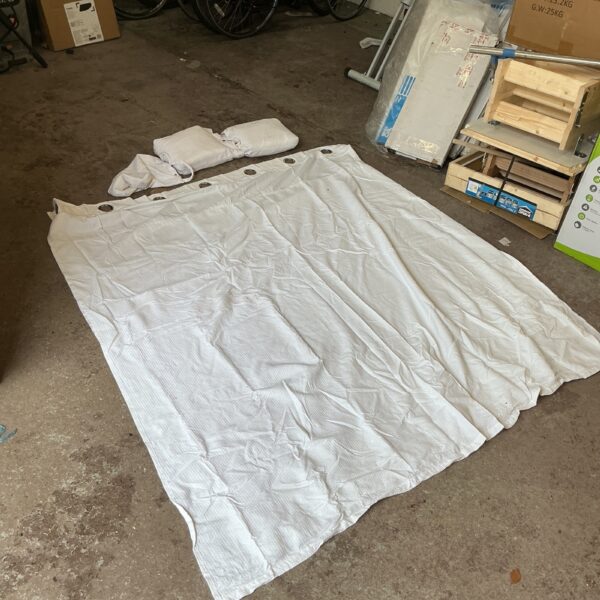 Lot of three white plastic shower curtains for bathroom use.