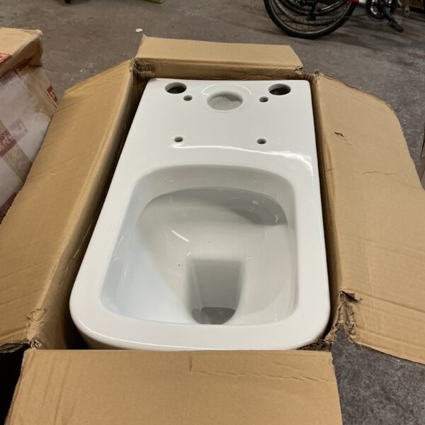 New white ceramic toilet pan still in its original packaging.