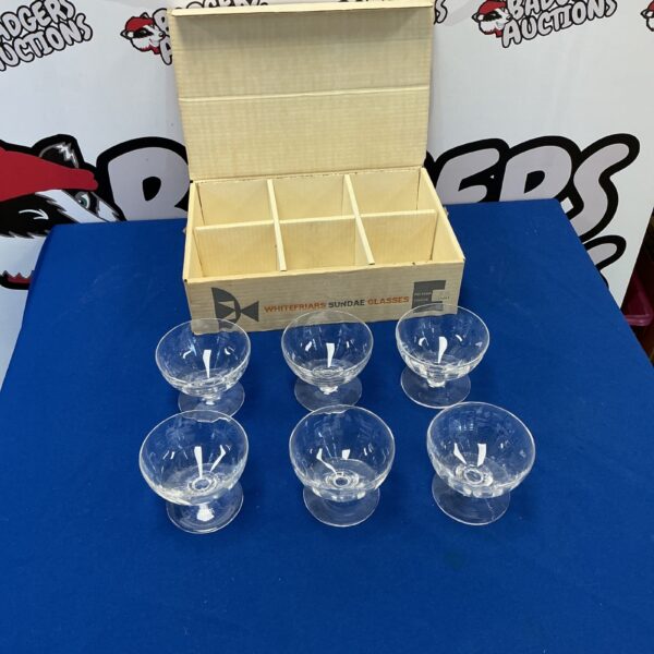 Set of six vintage Whitefriars Sundae Glasses on display.