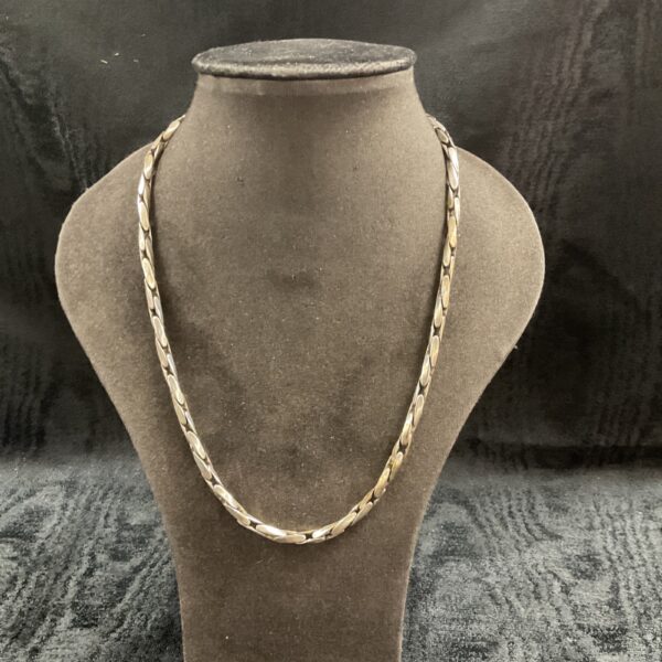 Close-up of a striking whitemetal heavy link necklace.