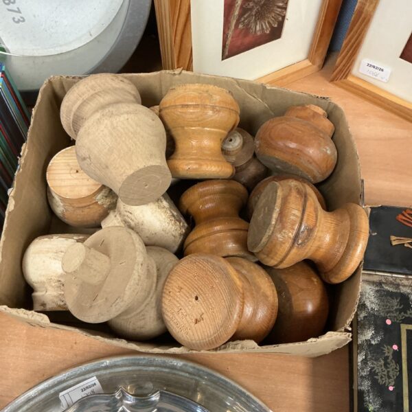 Lot of turned wooden furniture feet for restoration projects.