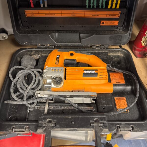 Worx wx65jsl jigsaw in original case, showing signs of use.