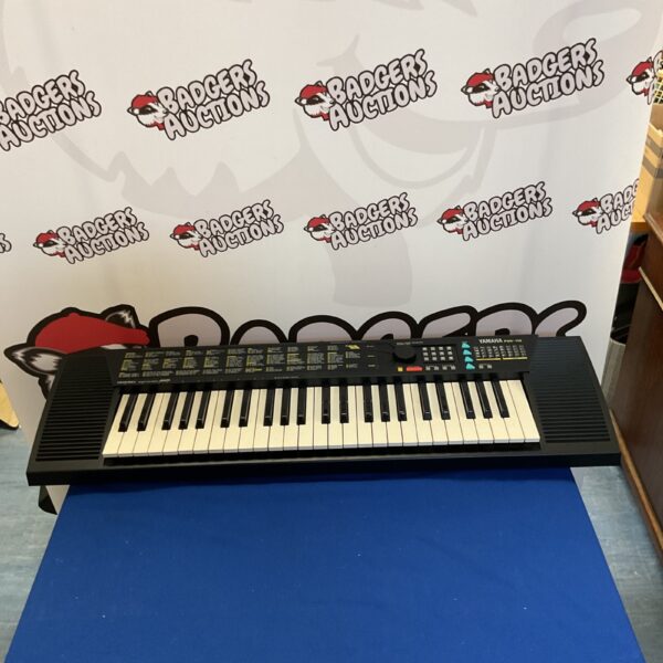Vintage Yamaha PSR-110 portatone keyboard with 61 keys.