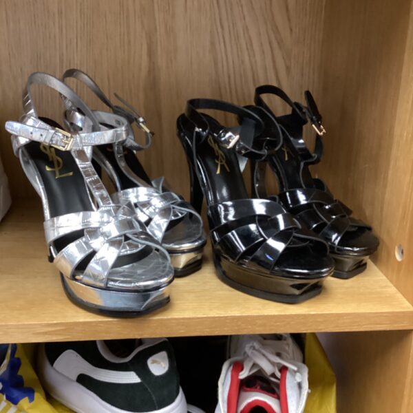 Silver Yves Saint Laurent open-toe high heel shoes.