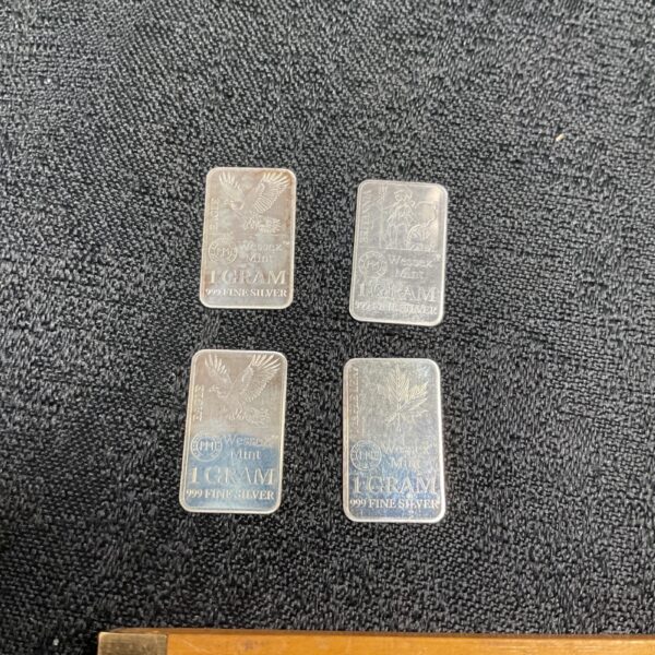 Four 1-gram silver ingots with eagle designs, .999 fine silver.