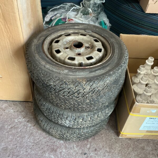 Used 13 inch car wheels with five spokes.