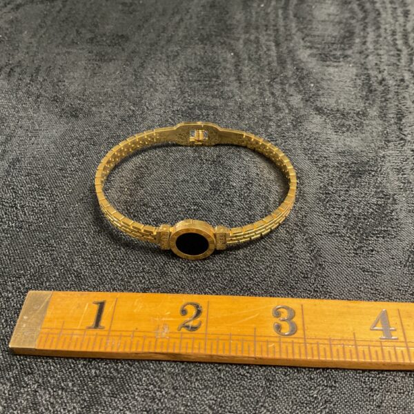 Elegant 18ct gold plated hinged love bracelet, fashion jewellery.