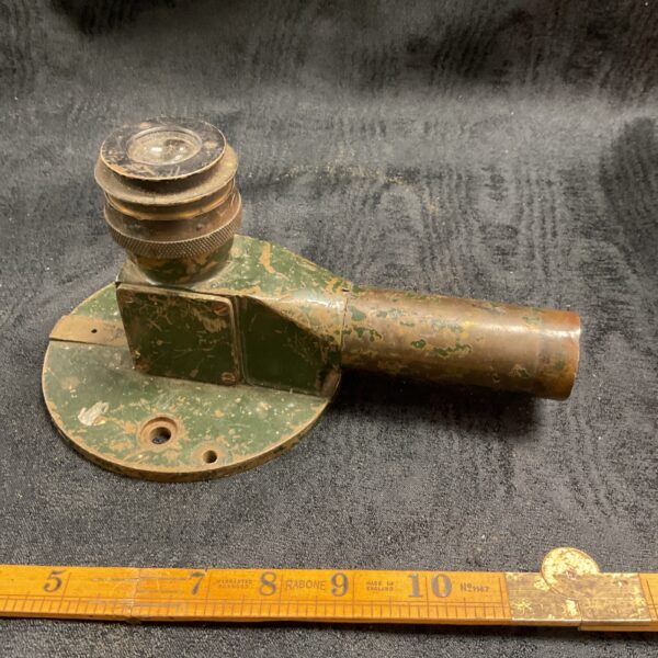 Vintage 1943 gun sight with telescopic view.