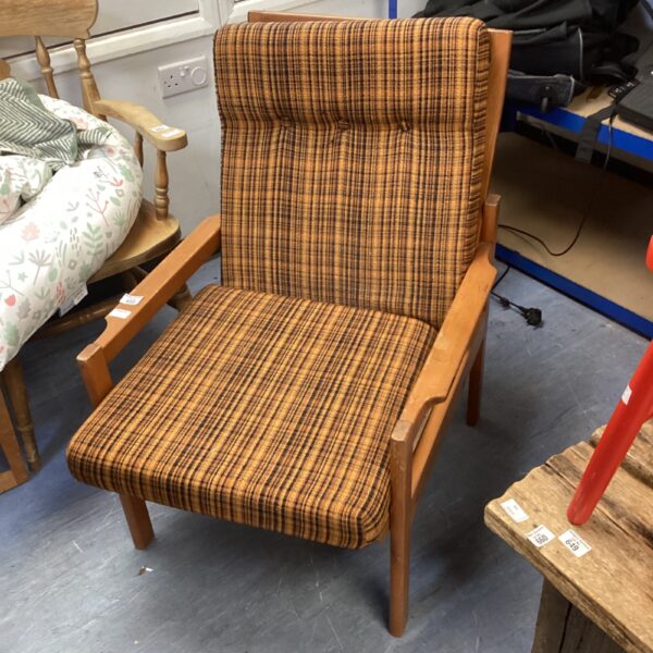 Vintage 1970s patterned armchair with wooden frame.