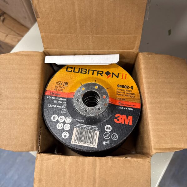 Box of nine new 3M Cubitron II 125mm grinding wheels for metal cutting.