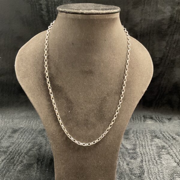 Close-up of a 925 silver anchor chain necklace on a display.