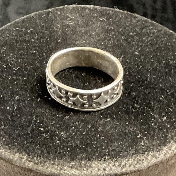 Sterling silver band ring, size R, detailed design.