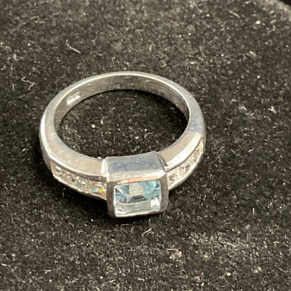 Silver ring with cubic zirconia stone, size K.