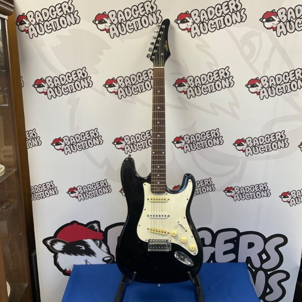 Black Abilene electric guitar, vintage style musical instrument.