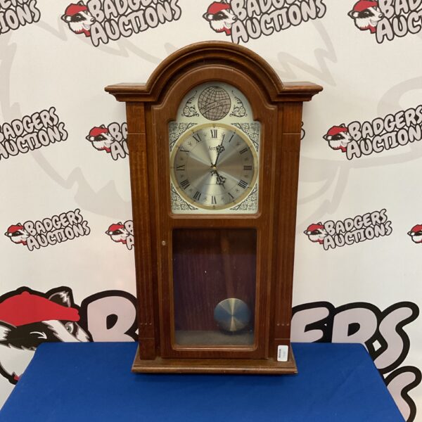 Vintage Acctim Westminster chiming wall clock with pendulum.