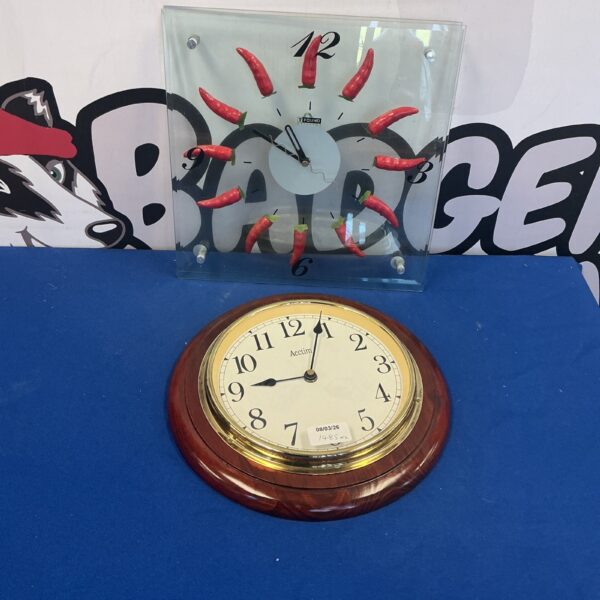Vintage Actim wall clock with black numerals on a white face.