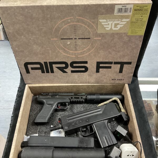 Airsoft BB pistols in original packaging, toy guns for sale.