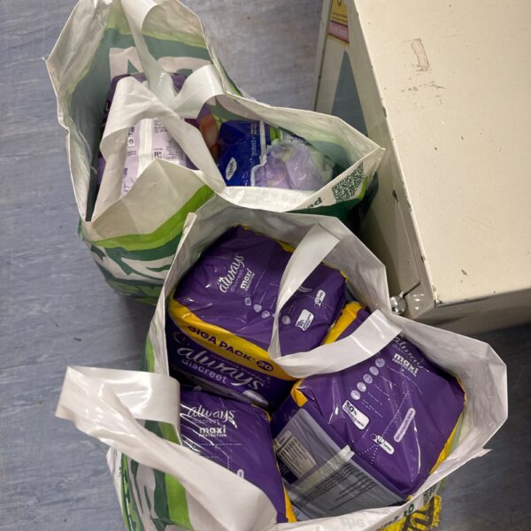 Two bags of Always Discreet XL sanitary towels for incontinence and hygiene.