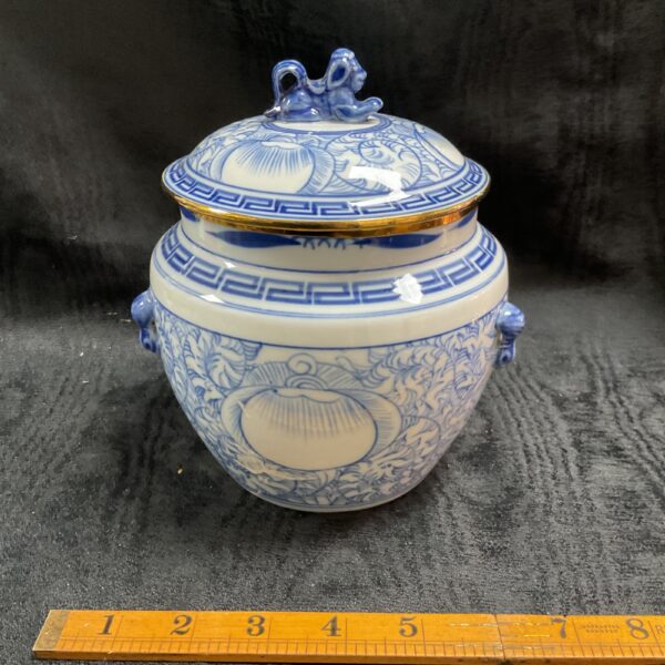 Antique Chinese Kamcheng jar with blue and white floral design.
