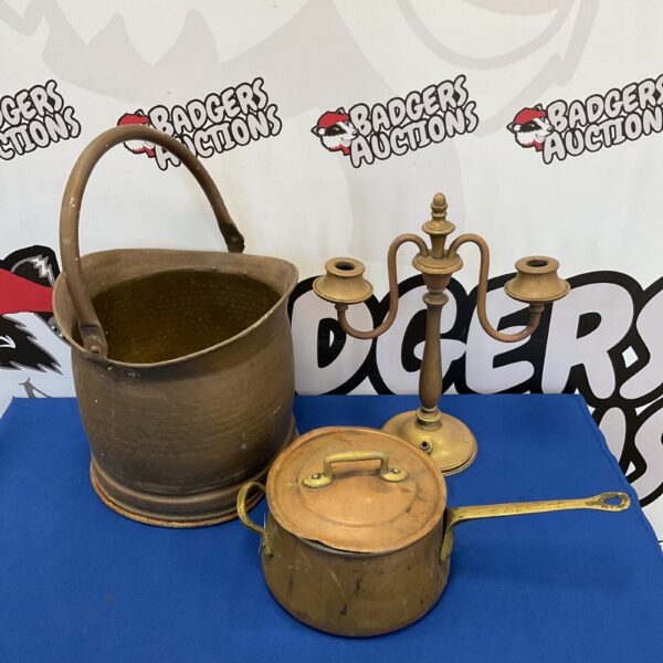 Antique copper coal scuttle with saucepan and candelabra for fireplace use.