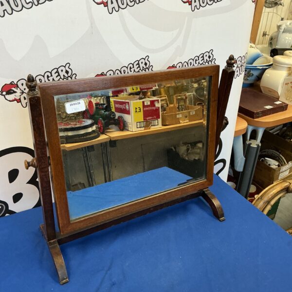 Antique mahogany dressing table mirror with shaped frame.