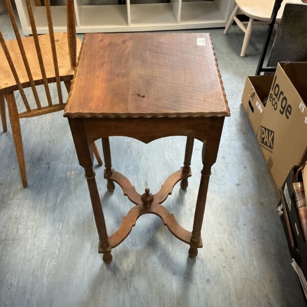 Antique mahogany hall table with curved legs and square top.