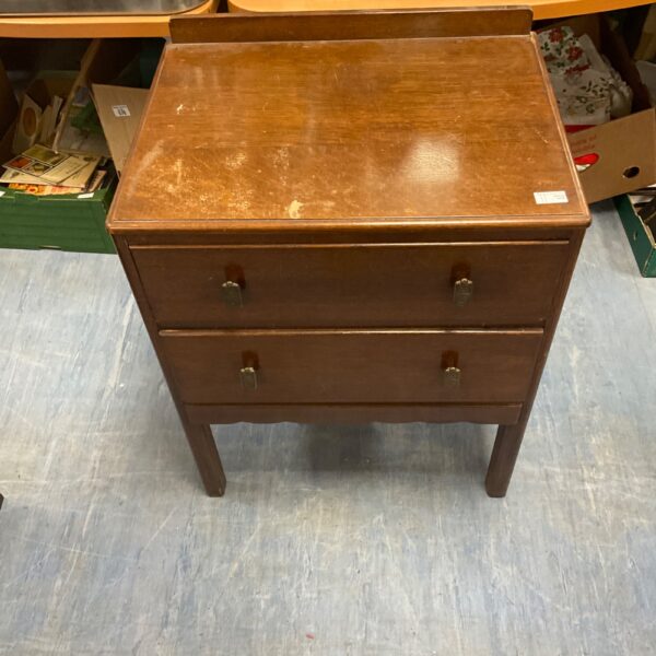 Antique oak chest of drawers with two drawers, vintage bedroom furniture.