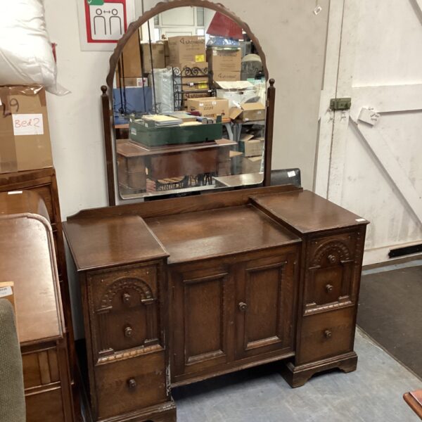 Antique oak dressing table with swing mirror, vintage bedroom furniture.