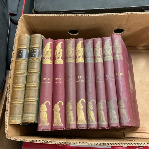 Collection of antique *Punch* annuals from 1914-1918, British satirical magazines.
