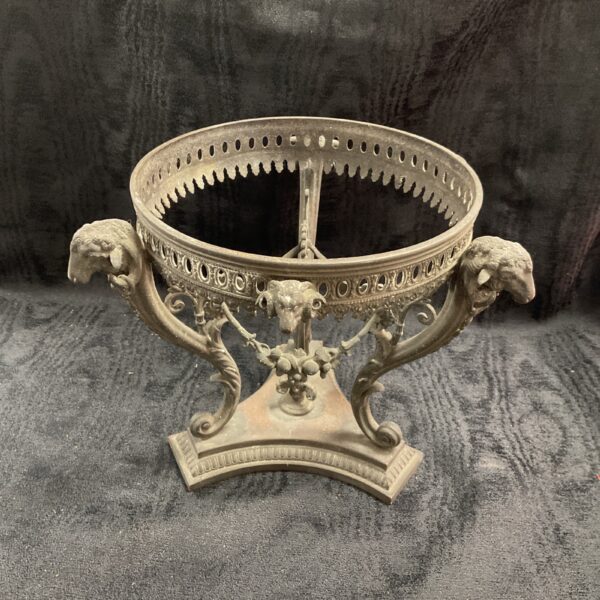Antique neoclassical pedestal bowl with rams head detail.