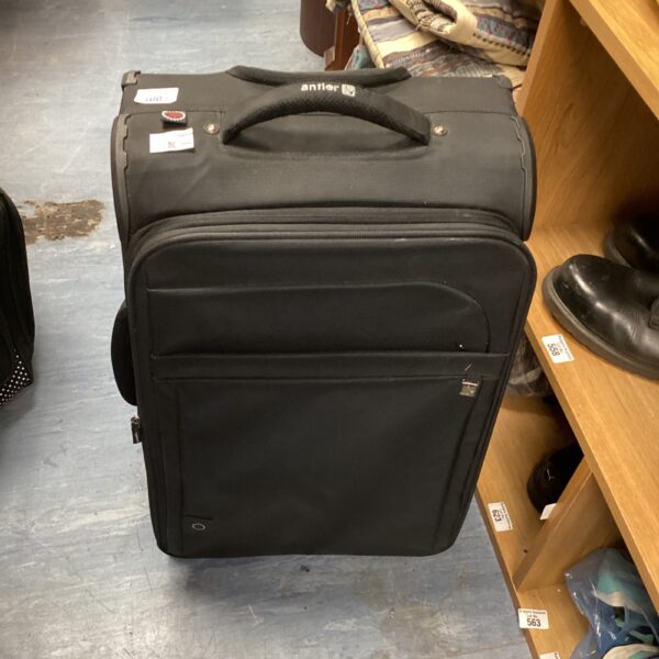 Vintage Antler wheeled suitcase with extendable handle for travel.