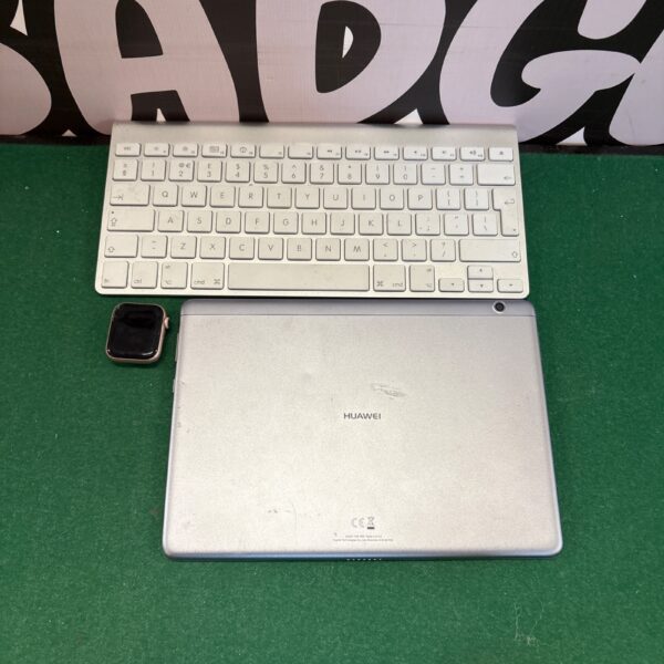 Apple Mac keyboard, Apple Watch, and Huawei tablet bundle for sale.