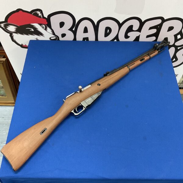 Vintage Armex 44MRC1445 bolt action rifle with wooden stock.