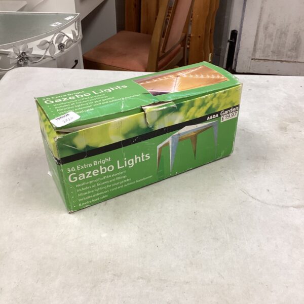 Box of Asda garden gazebo lights for outdoor garden decoration.
