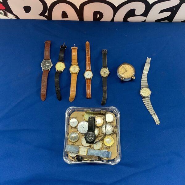 Tray of assorted vintage watches, antique timepieces for collectors.