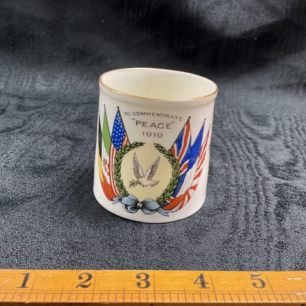 Vintage Aynsley peace commemorative mug with flags and eagle.